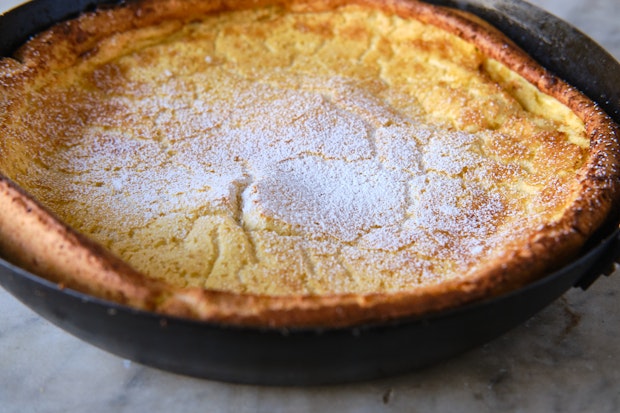 dutch baby pancake in a skillet after baking