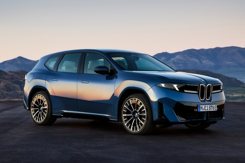 Front 3/4 view of a blue 2026 BMW iX3