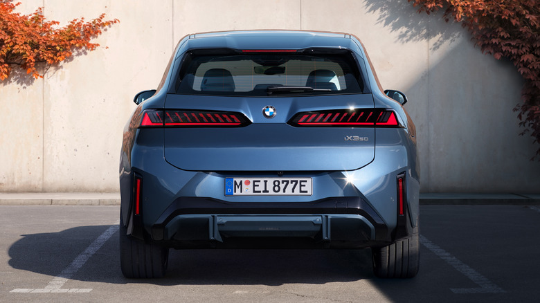 Rear end of a blue 2026 BMW iX3