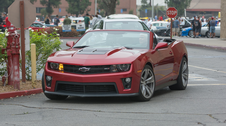 A red 2015 Chevrolet Camaro ZL1 convertible, one of the last models to feature an LS-series engine.